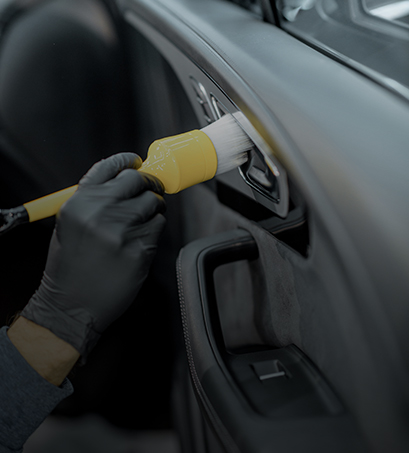 Interior car detailing — clean dashboard and seats